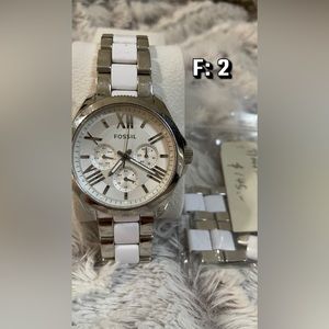 White and Silver Fossil Watch with White face.